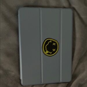 Stylish Gray Tablet Cover with Iconic Logo